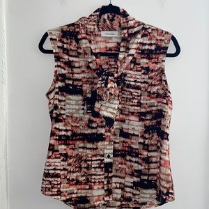 Calvin Klein women’s salmon/black bow blouse, S